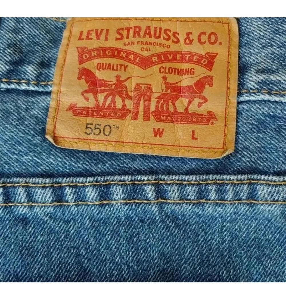 Levi's 550 Jeans Blue Denim Zip Fly Bootcut Leg High Rise Relaxed Fit Men 50/30
